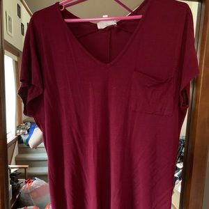 red flowing tee with left side chest pocket